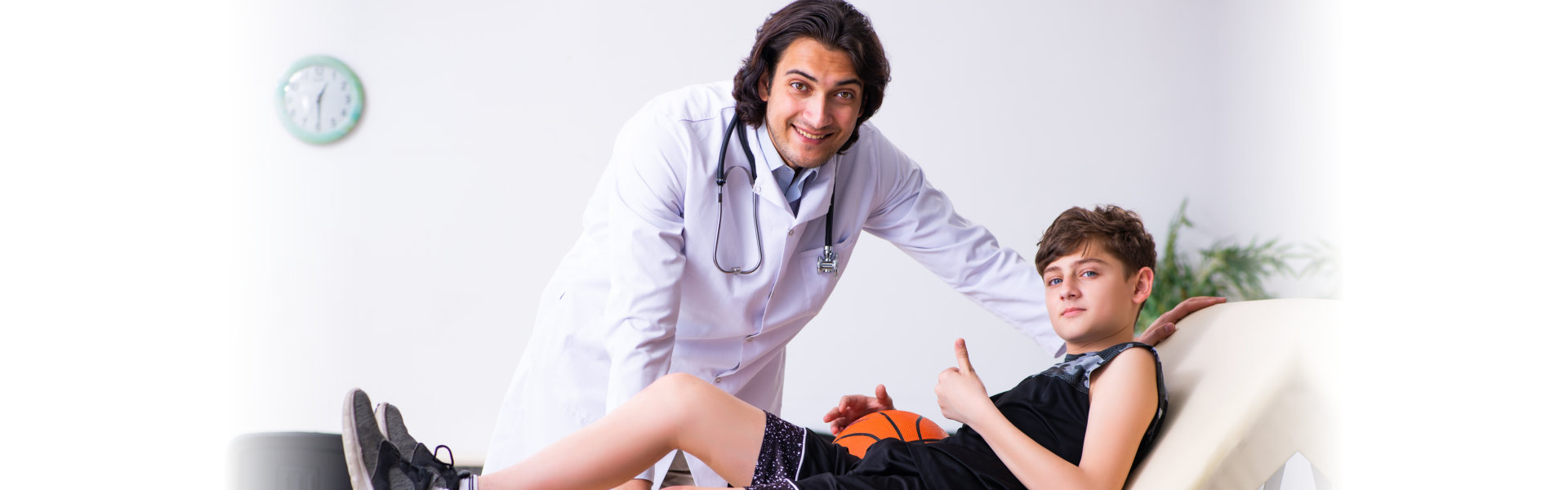 young basketball player visiting the doctor