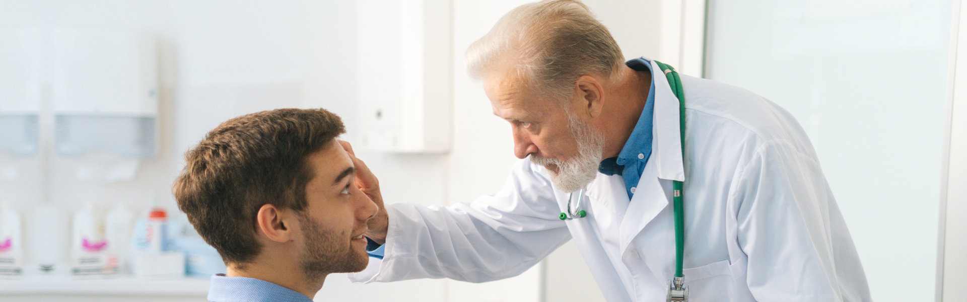 doctor checking the patient's eyes