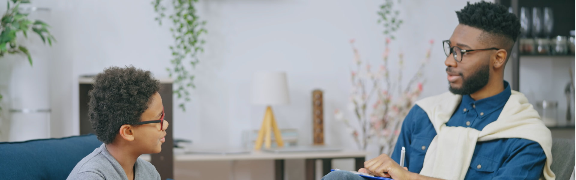 therapist talking to a child