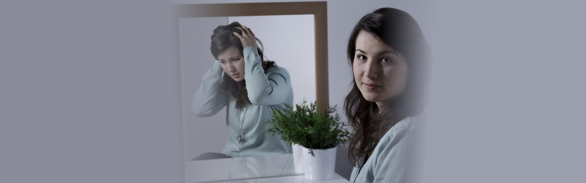 Young woman with depression hiding her emotions